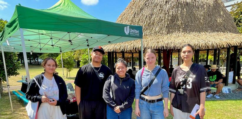  Pacific students standing in front of the Fale at Unitec's 2025 orientation